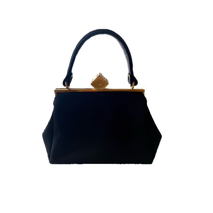 December 9 - If You See a Great Evening Bag, Buy it!
