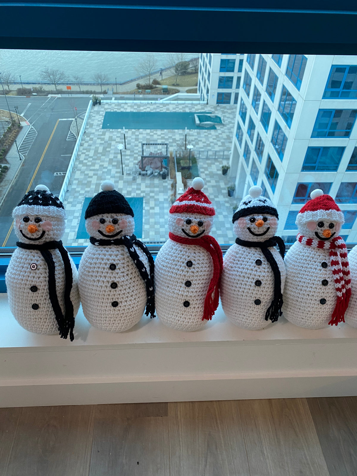 Our cute as can be crocheted snowman featuring multiple color options all with a shining smile to see you through the holiday season with a little extra cheer