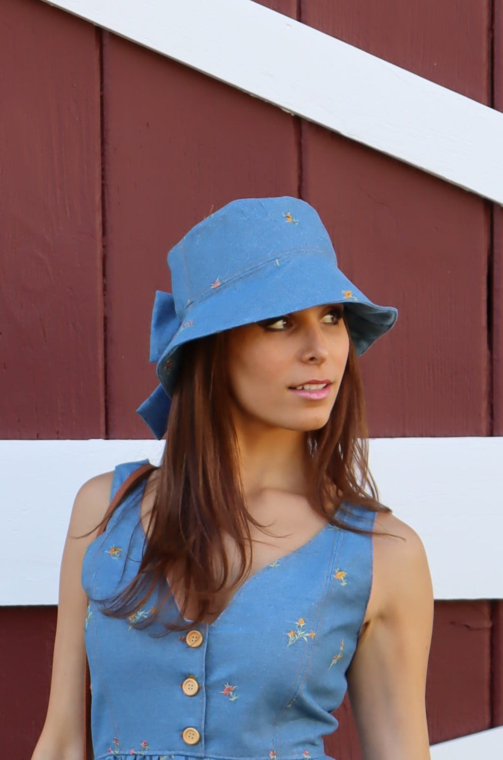 Model wearing Floral Denim Bucket Hat with Bow.